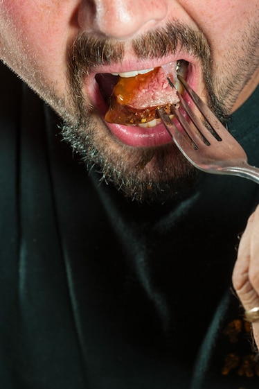 a man eats a steak in Texas