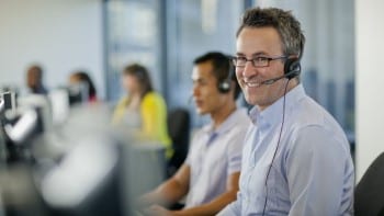 Man in call center with headset