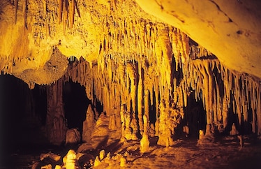 a dark cave of stalactites