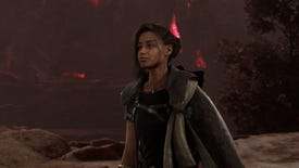 Frey, the protagonist of Forspoken, a young Black woman wearing a fantasy-y grey cape, standing against a rocky red-and-grey landscape