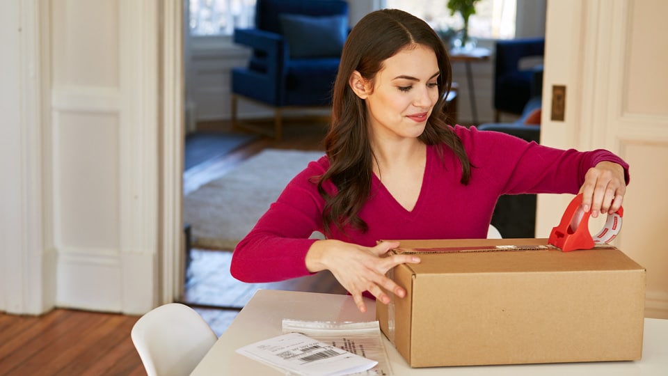 Woman preparing UPS return