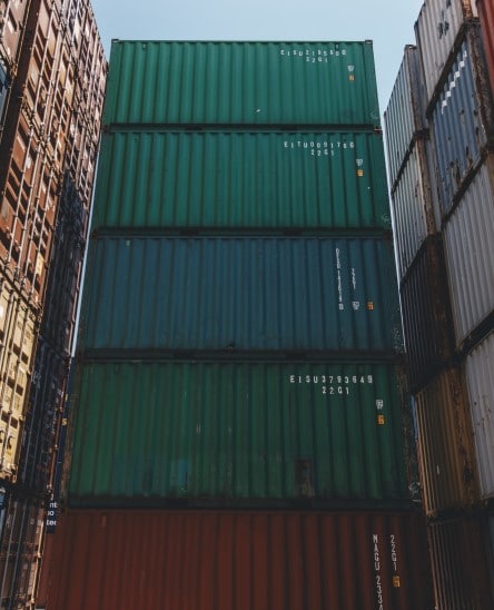 Handler loading freight on commercial air carrier