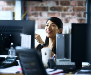 Woman surrounded by technology