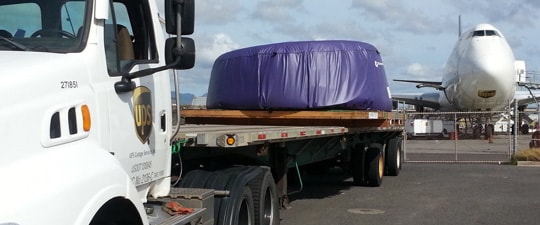 Engine cowling on ground freight tractor trailer