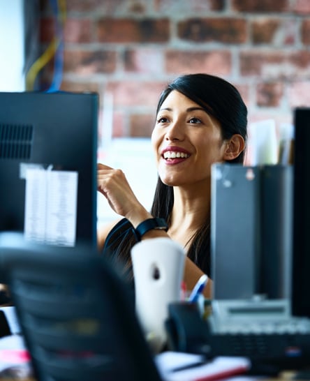 Woman surrounded by technology