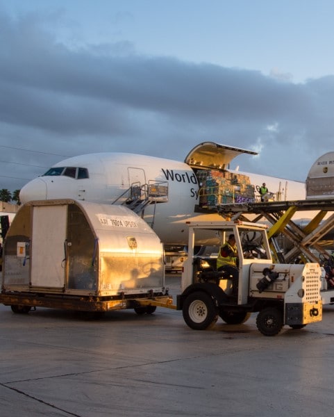 Freight plane being loaded with cargo