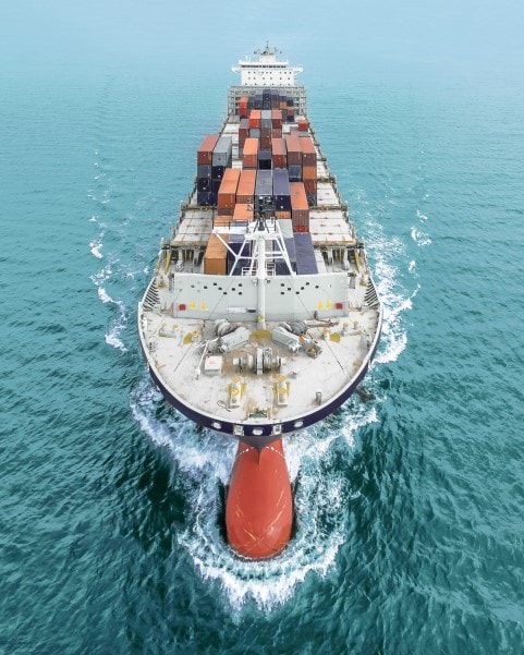 Freight container ship in the middle of the ocean