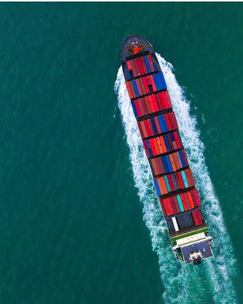 ocean container ship sailing through the ocean