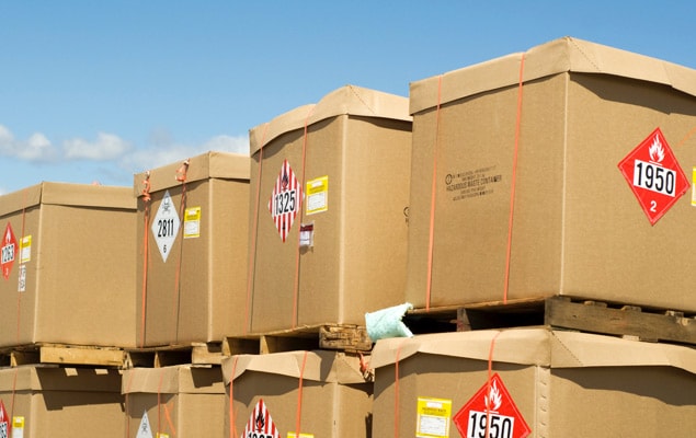 Hazardous materials shipments stacked on pallets