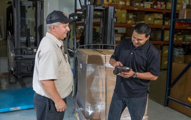 UPS courier getting customer's signature