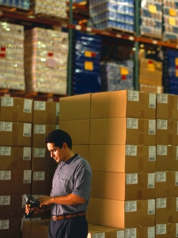 Man in warehouse with scanner