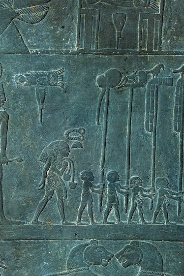 The Narmer Palette, from circa 3100 B.C. and housed at the Egyptian Museum, depicts the king, who wears the red crown of Lower Egypt.