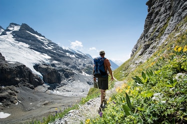 A man hikes the Haute Route, in the Bernese Oberland